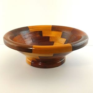 Handmade vintage Walnut and maple segmented pedestal wood bowl.